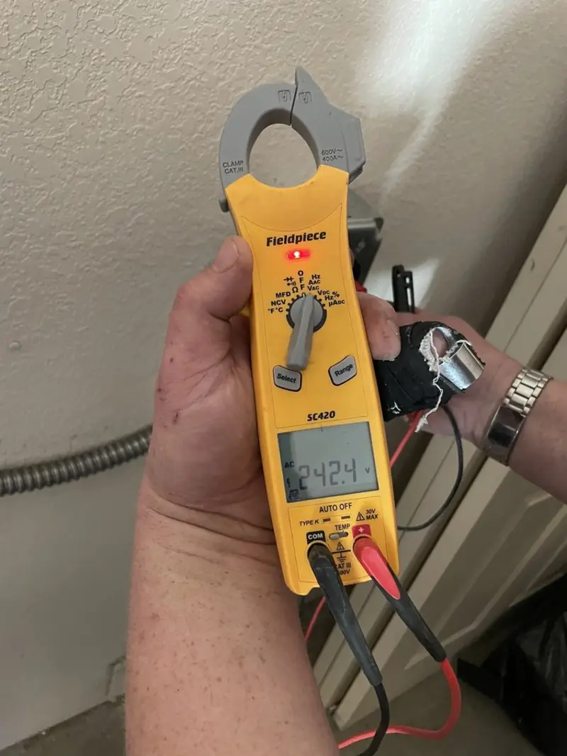 Voltage testing with clamp meter during Generator Installation in Grand Prairie